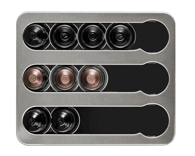 Capsule holder from above holding nine capsules in black and copper in its three channels